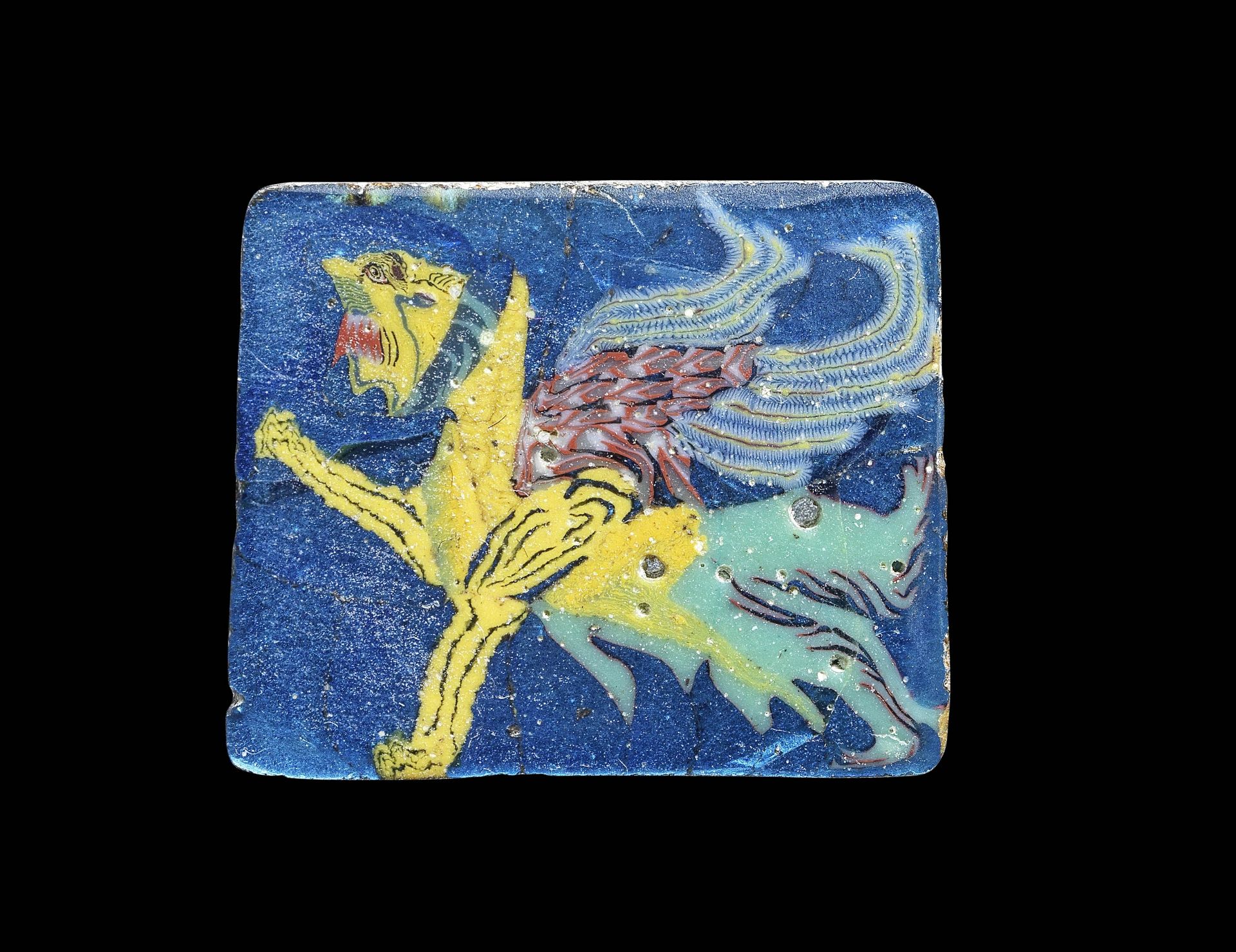 An Egyptian mosaic glass griffin inlay