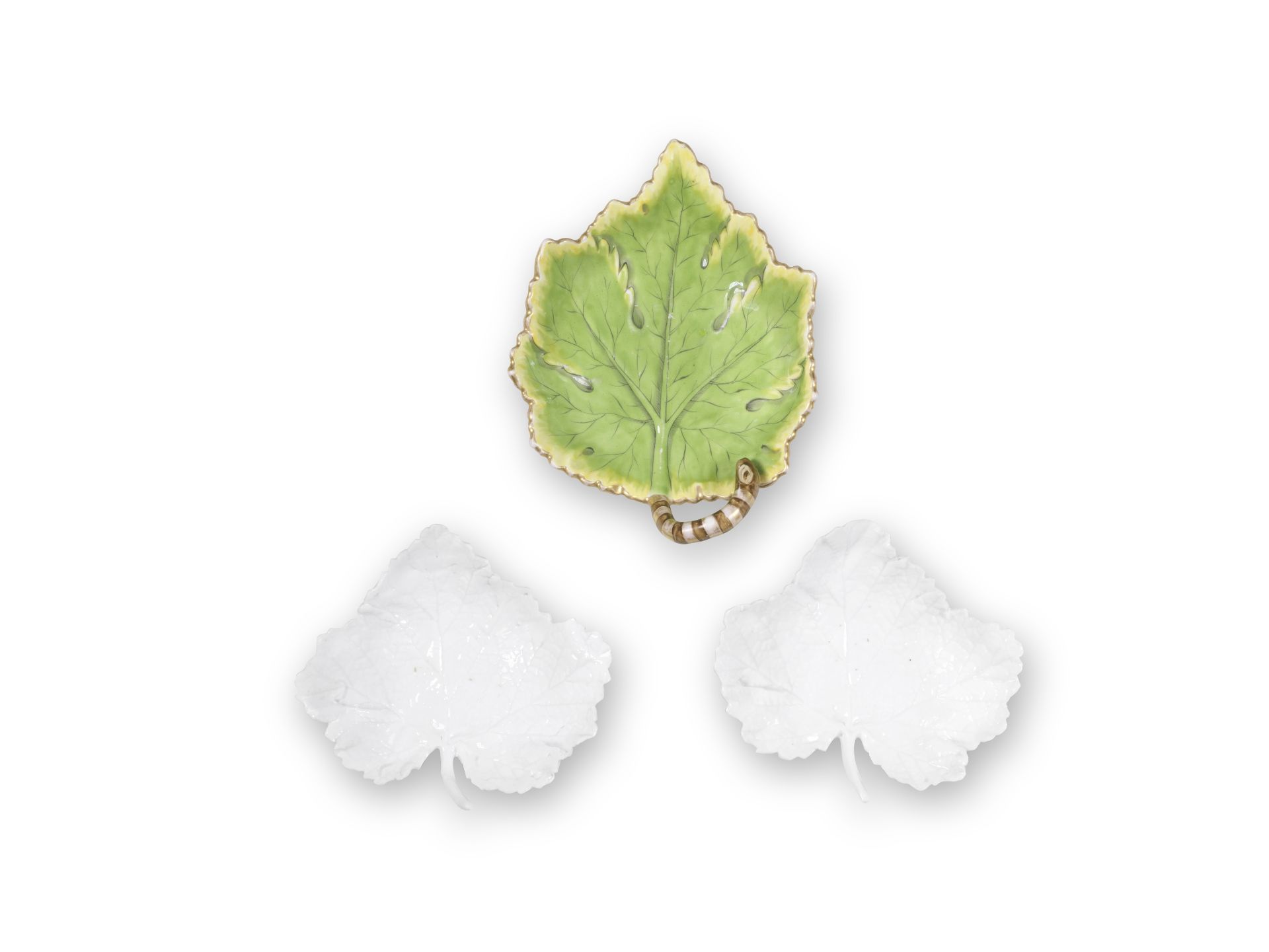 A pair of Doccia white leaf-shaped dishes together with a F&#252;rstenberg leaf-shaped dish, late...