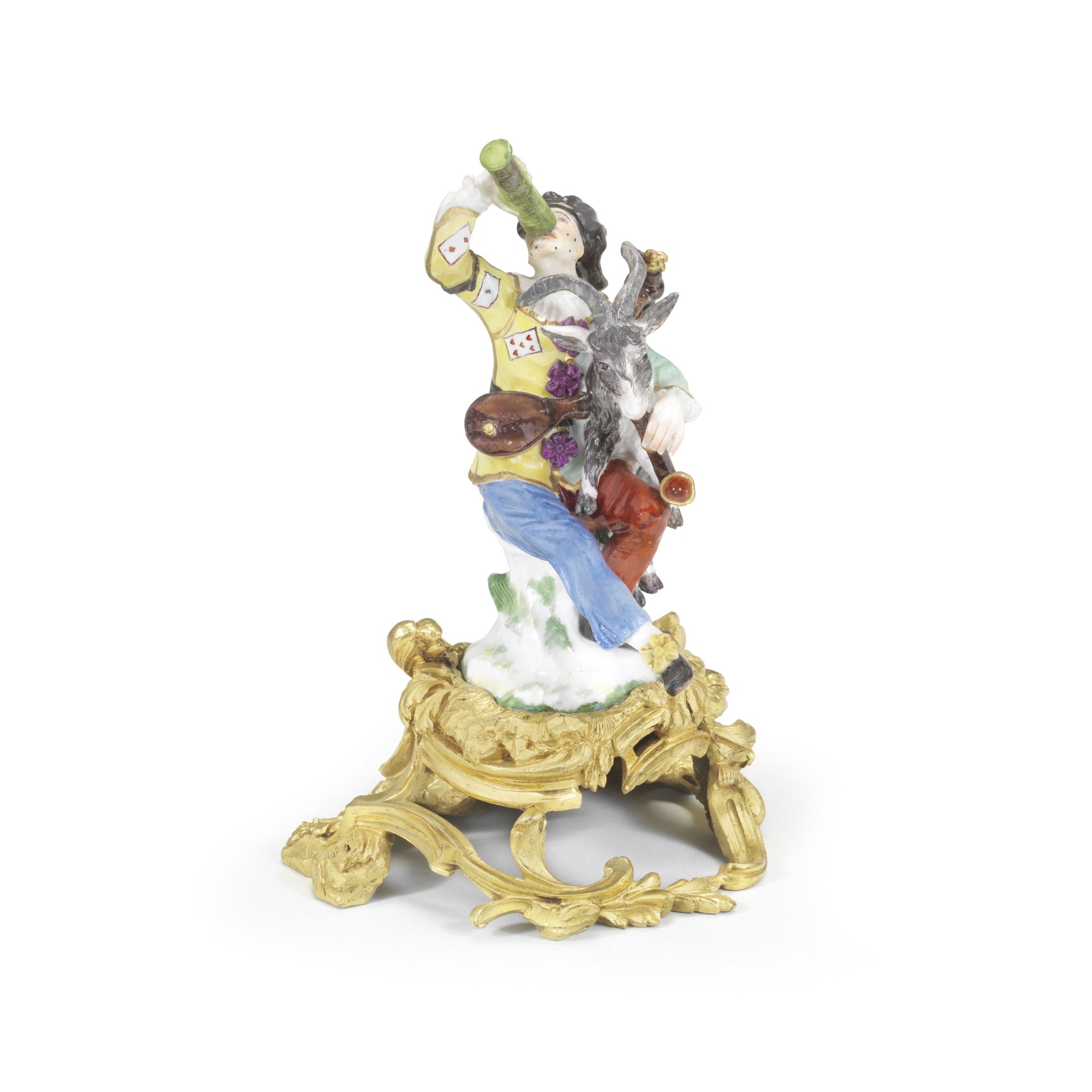 A rare Meissen ormolu-mounted figure of Harlequin with a 'Pass Glass', circa 1740