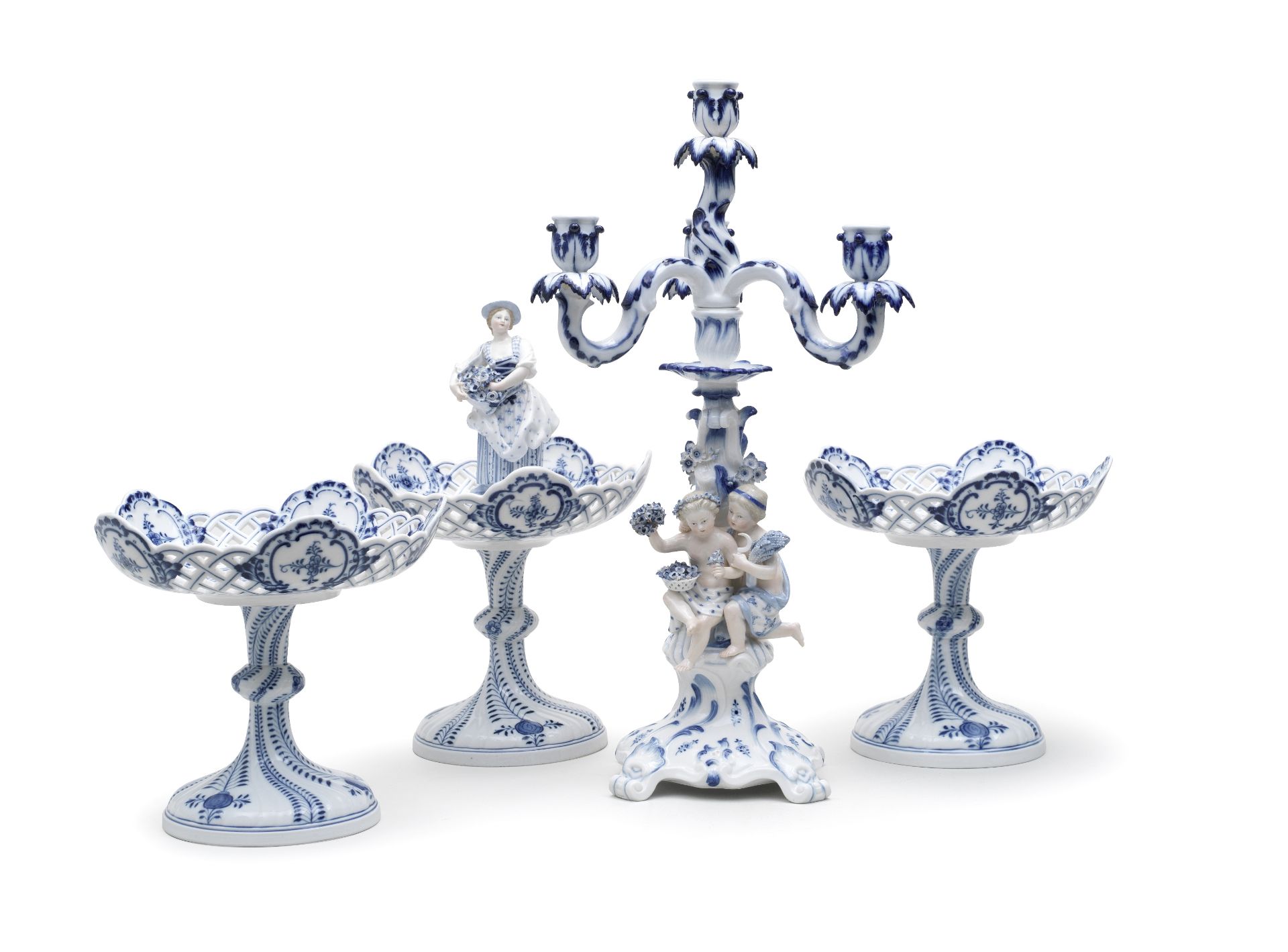A Meissen three-branch candelabrum, together with three tazzas, late 19th century