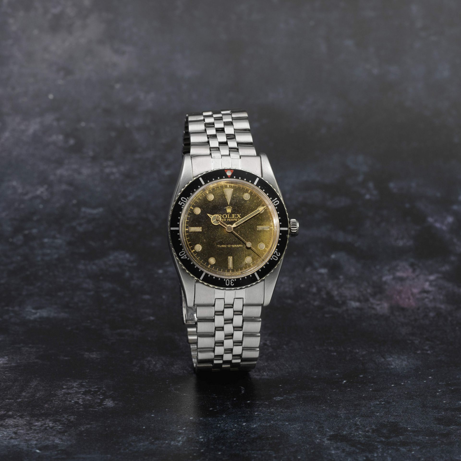 Rolex. A fine and rare stainless steel automatic bracelet watch with gilt dial Turn-o-Graph, Ref...