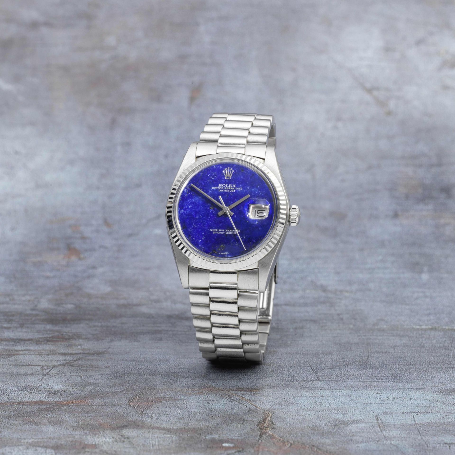 Rolex. A fine and rare 18K white gold automatic calendar bracelet watch with lapis lazuli dial D...