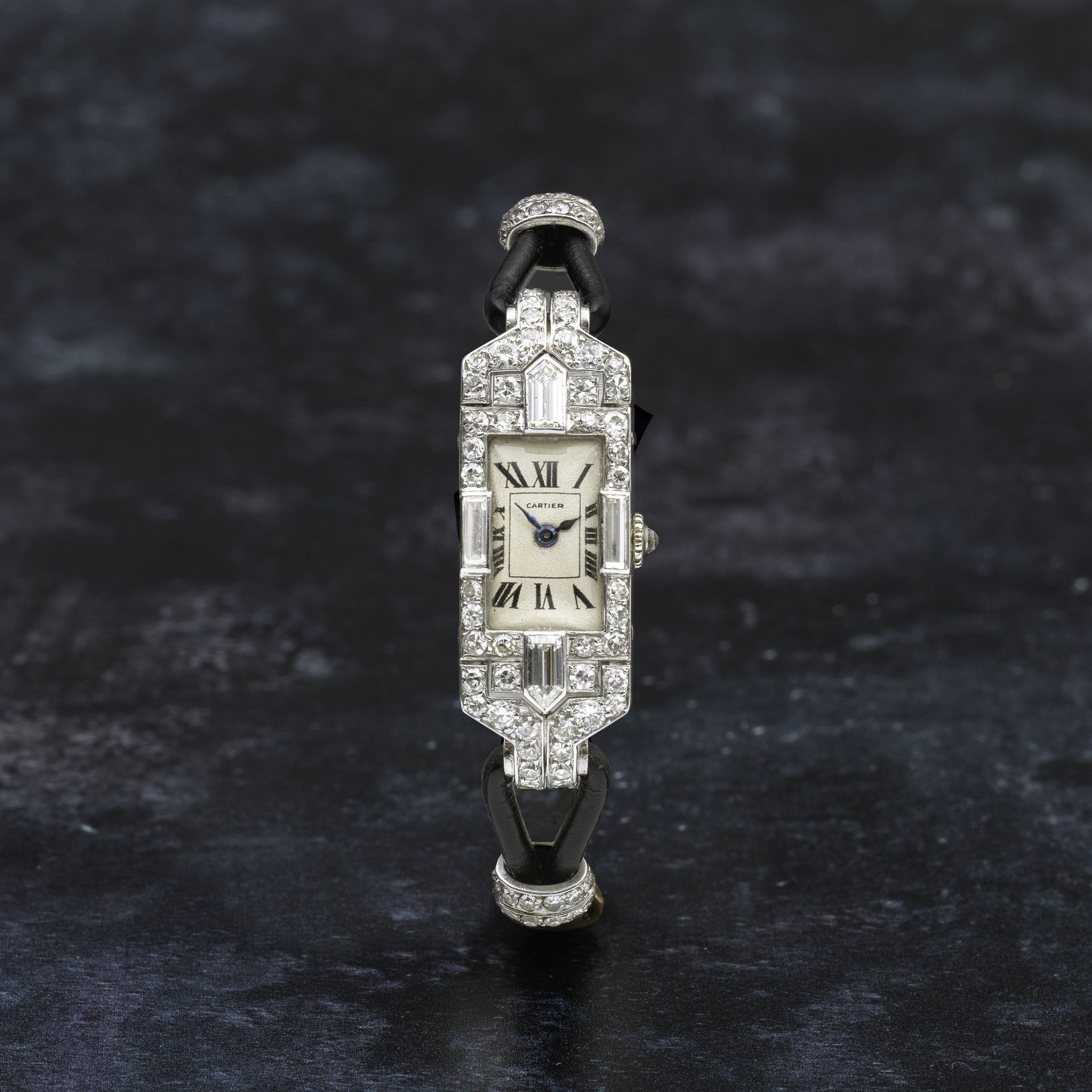 Cartier. A fine and early lady's platinum and diamond set manual wind cocktail watch Ref: 25619, ...