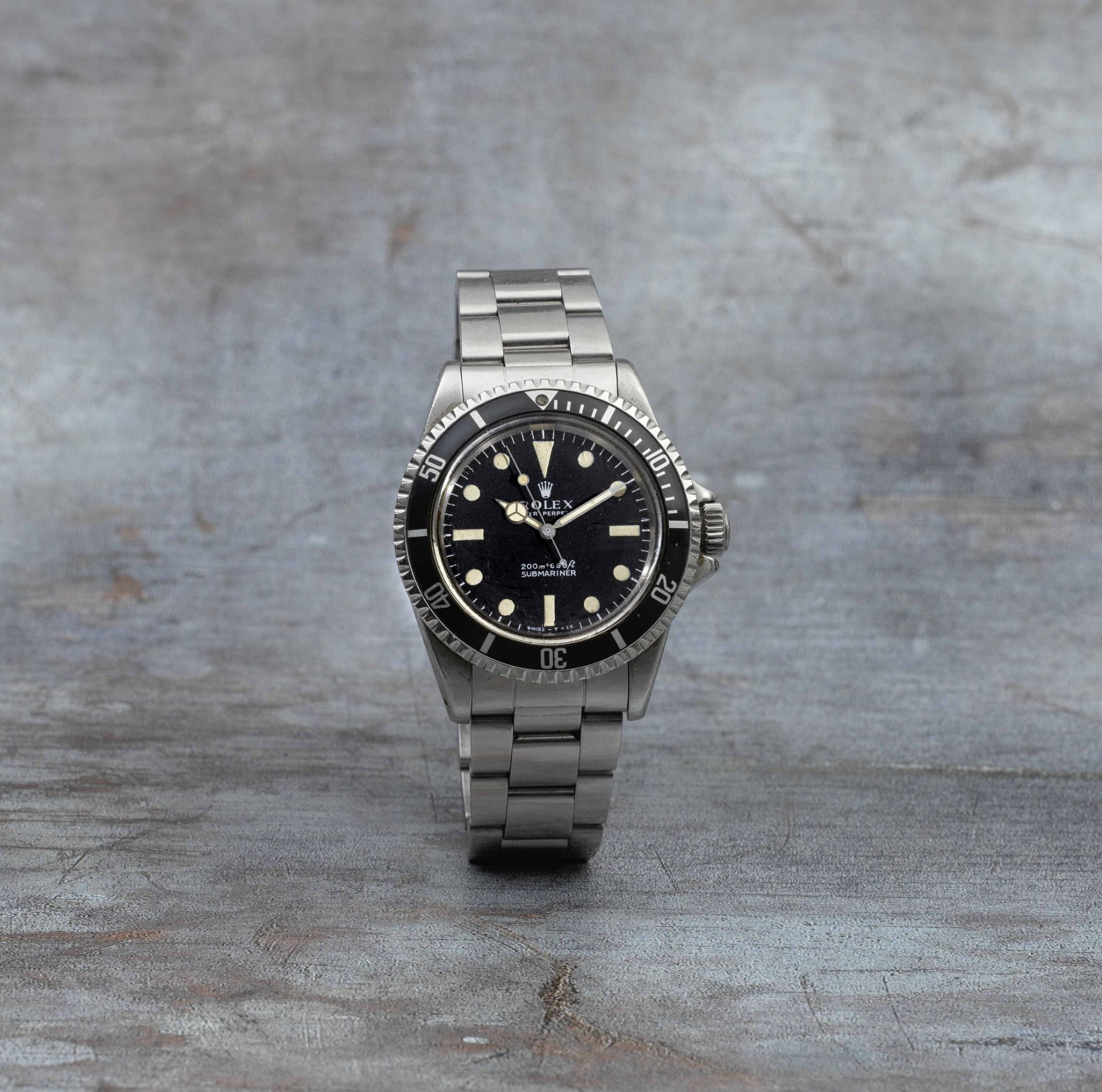 Rolex. A stainless steel automatic bracelet watch with metres first dial Submariner, Ref: 5513, ...