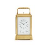 A fine and rare French brass grande sonnerie carriage clock with running seconds, days of the wee...