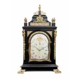 A late 18th century English ebonised and metal-mounted centre-seconds table clock Unsigned