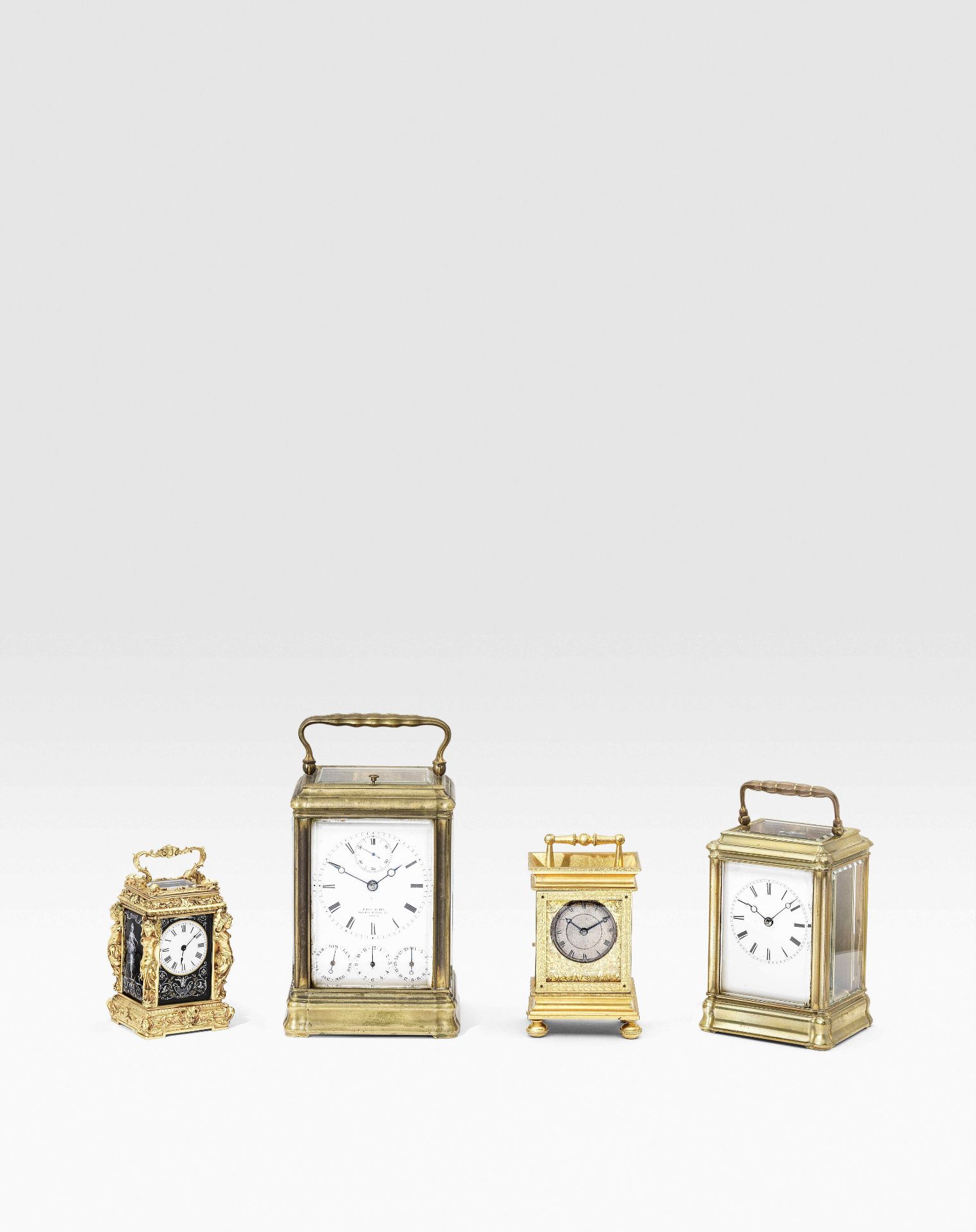 A very fine and rare 19th century French miniature caryatid carriage timepiece set with four Limo...