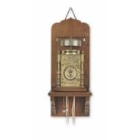 A rare 19th century Japanese weight driven wall clock with alarm, now in a later hooded case