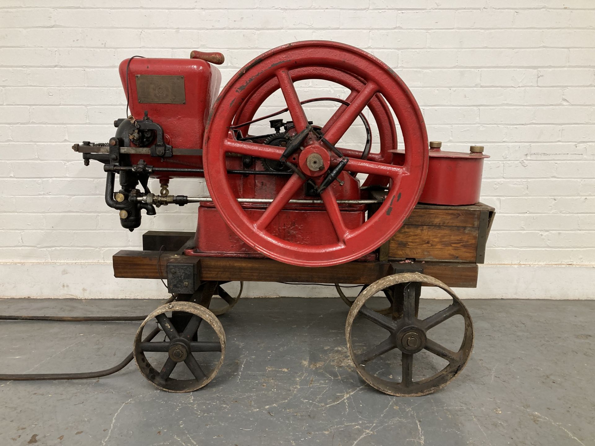 A 3 Mule Team 3HP 'Chore Boy Line' stationary engine by Associated manufacturers Co. of Waterloo ...