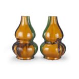 A pair of Arts and Crafts pottery vases Related to a design by Christopher Dresser, 20th century (2)