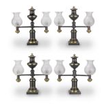 A set of four William IV gilt and patinated bronze twin-light Colza lamps By Messenger & Sons, Re...