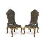 A pair of carved giltwood and gesso chairs Early 20th century, in the George I style (2)