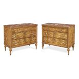 A pair of late 18th/ early 19th century tulipwood and fruitwood parquetry commodes (2)