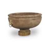 An Italian stone cistern 17th century or earlier, later mounted (2)