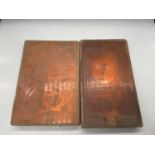 Two antique copper book presses.
