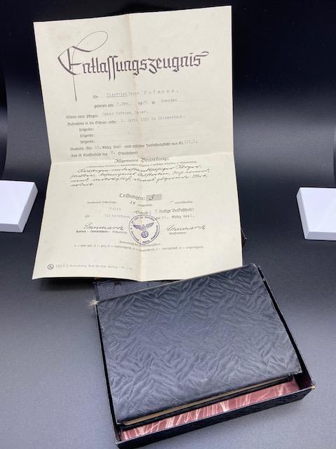 A German Gesangbuch book- dated 1937 together with a certificate. Certificate has a German Nazi sta