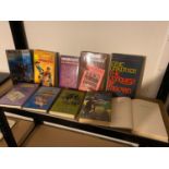 A collection of hardback novels by authors such as; Michael Moorcock, Alan Paton, Paul Theroux &