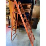 A Vintage set of wooden painters ladders. Can be used for interior design.