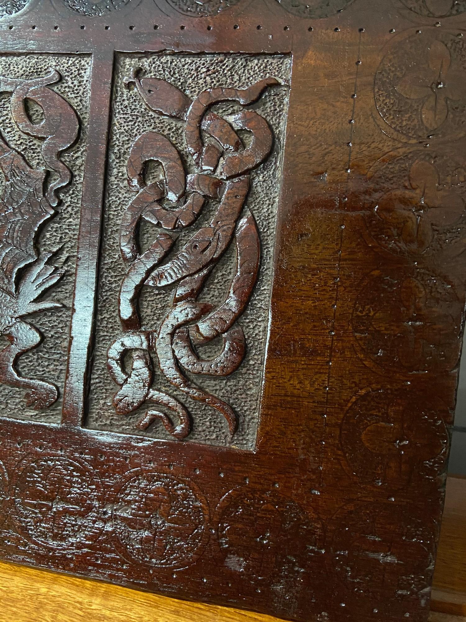 An Arts and crafts hand carved panel depicting Celtic trims and Dragons. [ - Image 4 of 4