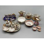 A Selection of miniature doll's porcelain Limoges tea/coffee sets Includes ornate wash basin set.