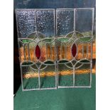 A Pair of Stain glass window panel sections. [