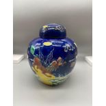 An early 20th century Chinese Wang Bing Rong Zuo preserve pot. Cobalt blue back ground with three