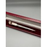 Richard Fox silversmith, London silver camel topped letter opener. Comes with original box. [50