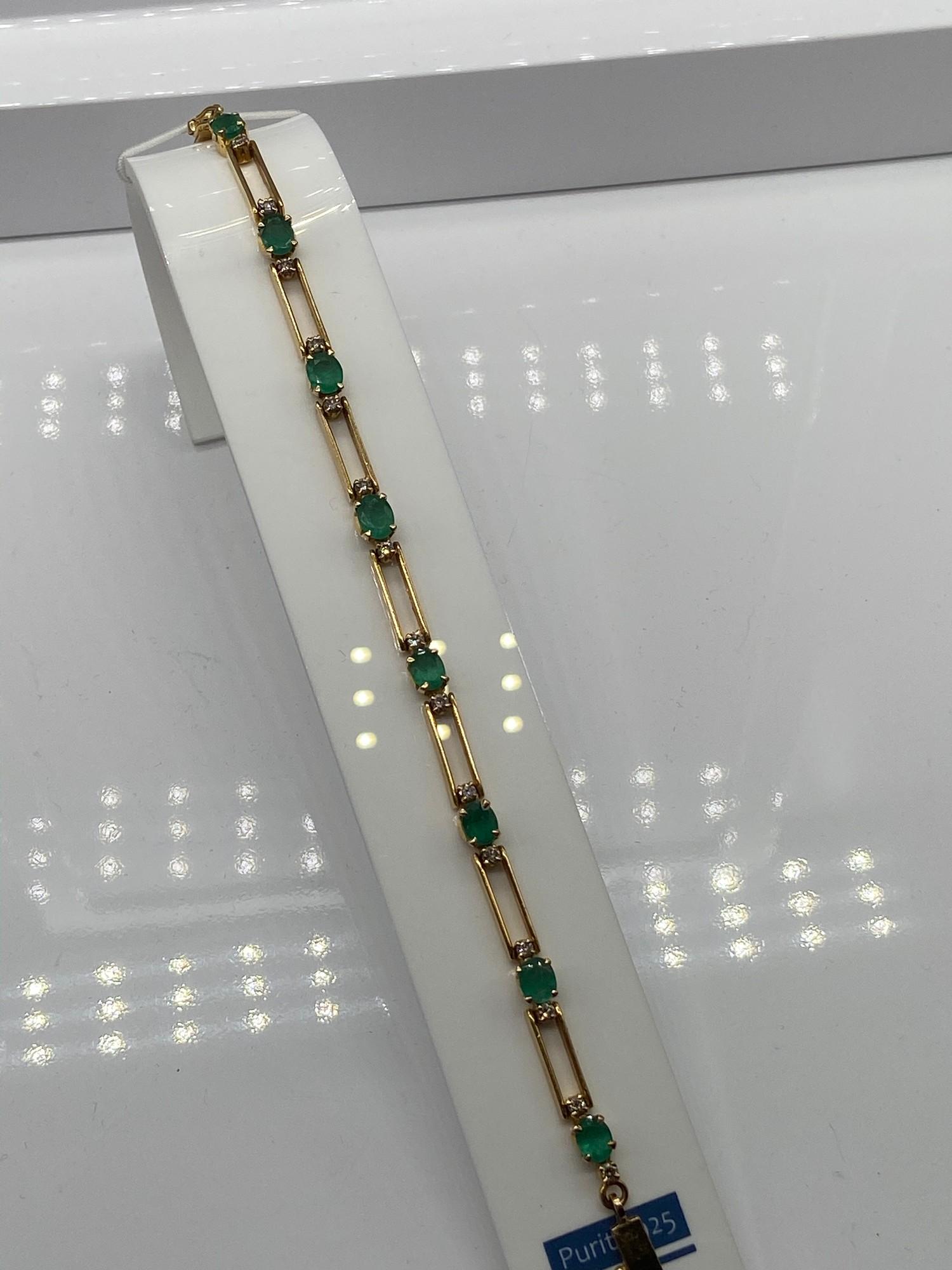 A Ladies 18k gold Diamond and Emerald bracelet. 0.64ct in total. [17 grams] [19cm in length]