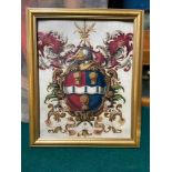 An 18th/ 19th century painting of a family crest. Fitted with a gilt frame.