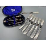 A Silver handle manicure set within a fitted case [scissors & needles not silver] Together with a