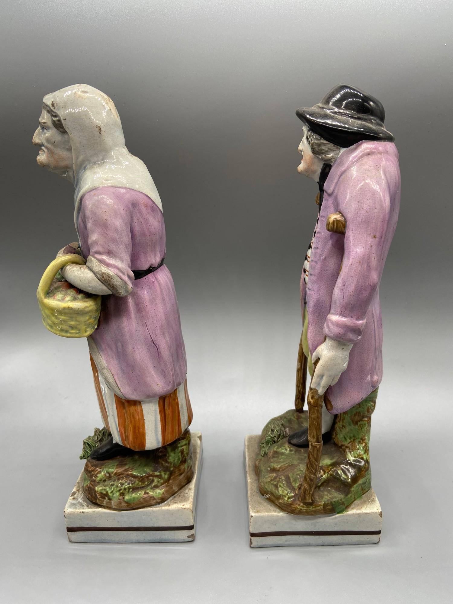 A Pair of Staffordshire Pearl Ware Old Age figurines. [As Found] - Image 2 of 6