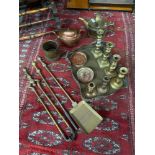 A Quantity of brass and copper wares. To include Victorian companion set, push candle sticks,