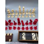 A 19th century ivory carved chess set, Vintage domino set and vintage counter.