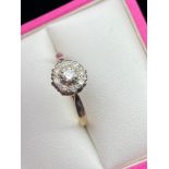 A Lovely example of a ladies 18ct gold diamond ring. Set with a single diamond centre of set by 8