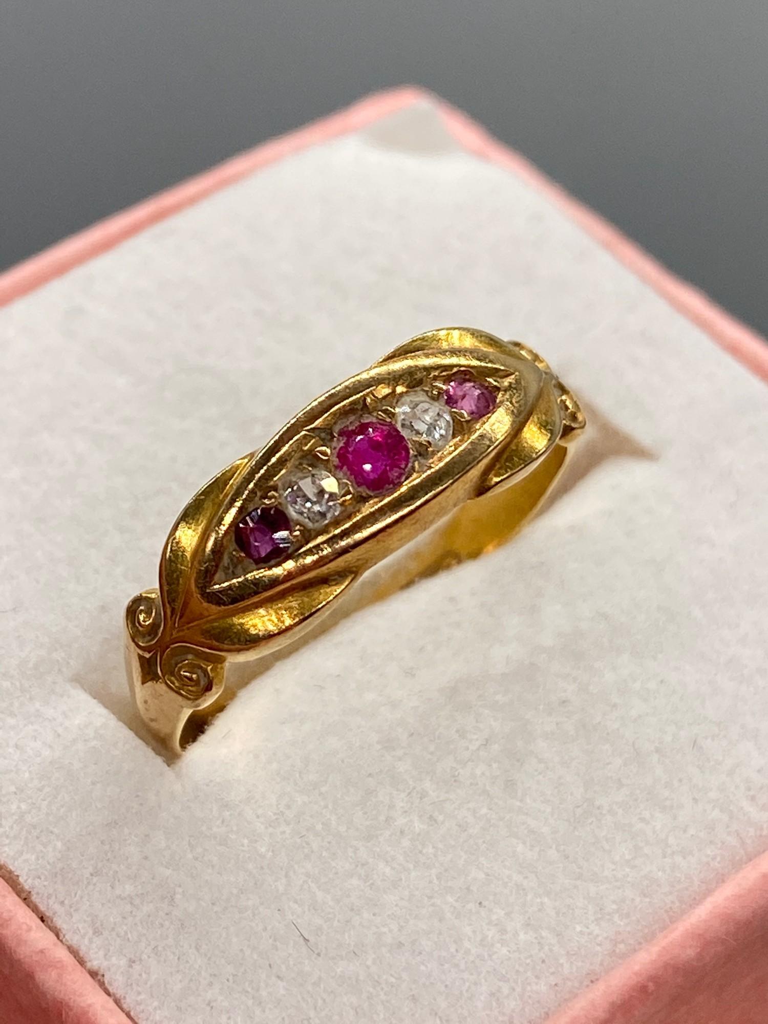 A Ladies 18ct gold diamond and pink stone ring. [Ring size J] - Image 3 of 4