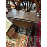 A 17th century drop end table. [As found]