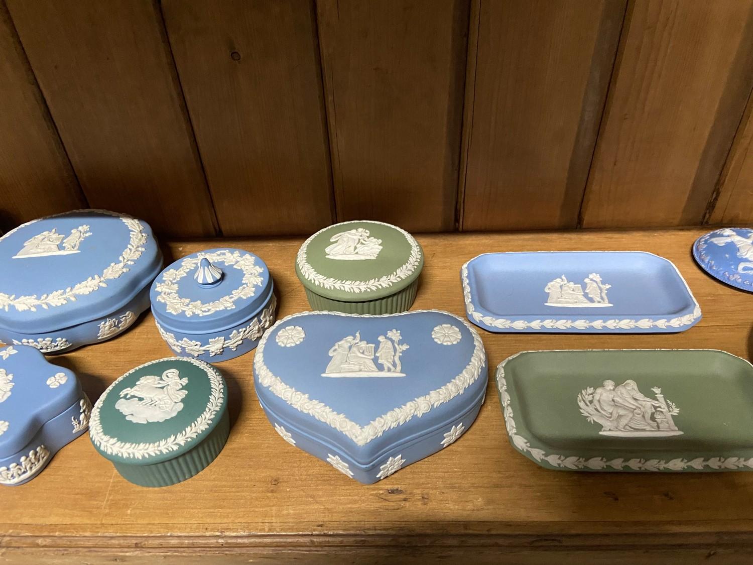A Shelf of Wedgwood Jasper ware trinket boxes and pin dishes. - Image 3 of 4