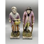 A Pair of Staffordshire Pearl Ware Old Age figurines. [As Found]