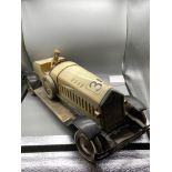 A Large 1930's rare tinplate clockwork racing car toy by the company Johann Distler, in cream