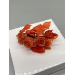 An Antique gold [tested 18ct-22ct] and hand carved coral rose design brooch/ Pendant. [9 Grams]
