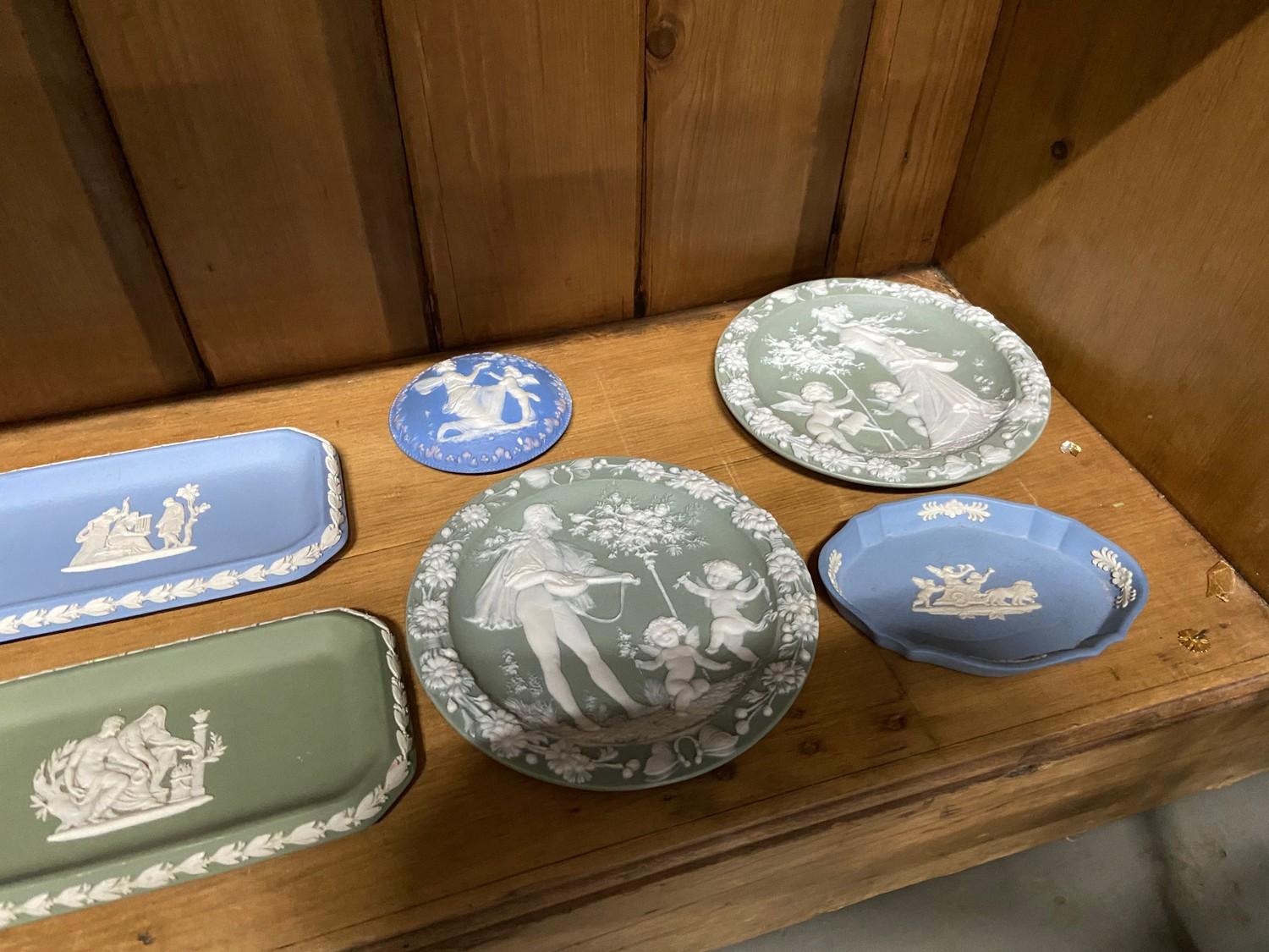 A Shelf of Wedgwood Jasper ware trinket boxes and pin dishes. - Image 4 of 4