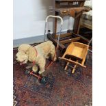 A Vintage push along St Bernard dog made in Ireland by Lines Bros Ltd. Together with a vintage Tri-