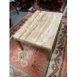 A Contemporary designer style marble top and brass base table.