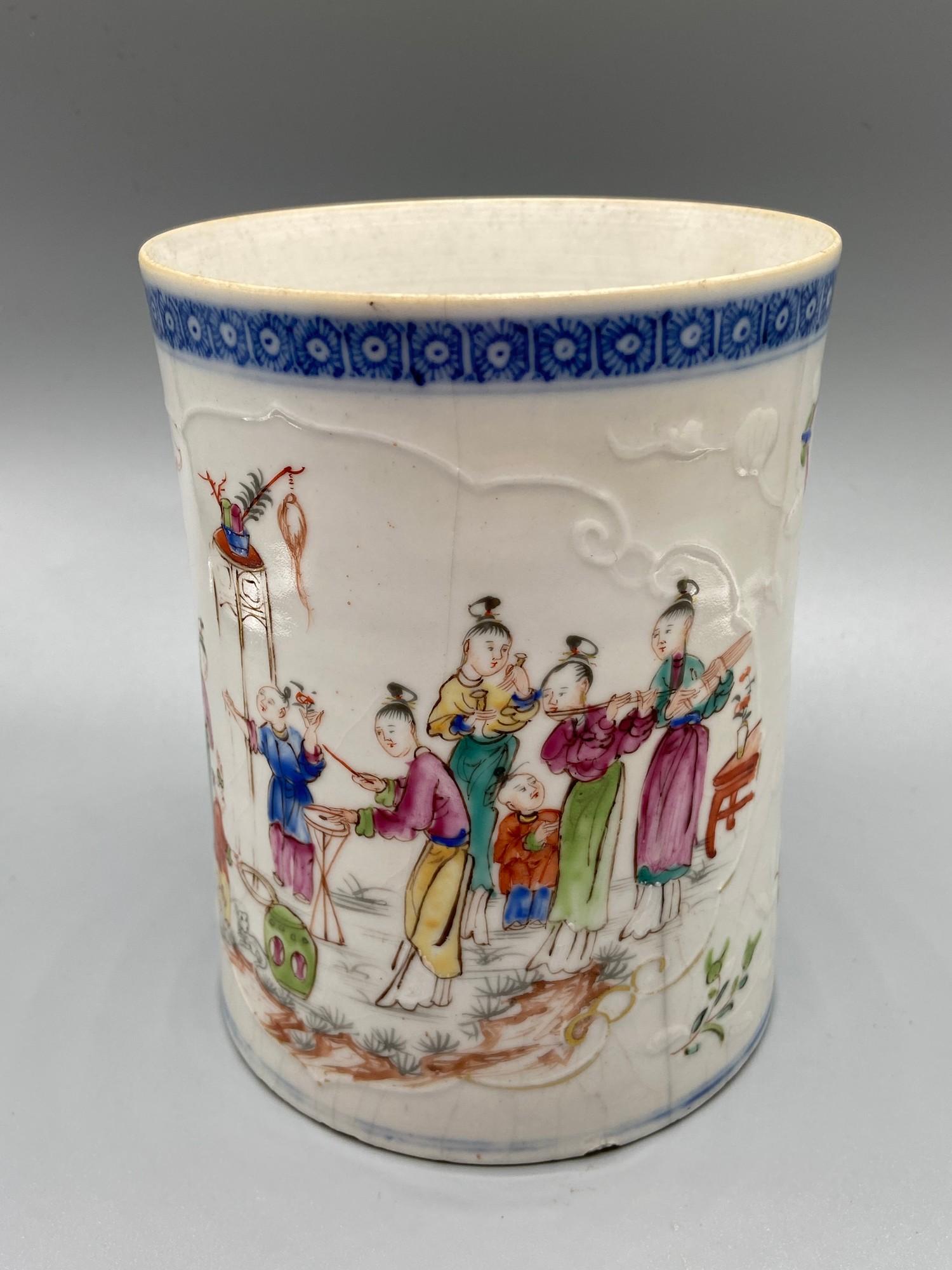 A large 19th century Chinese hand painted mug. Detailed with various hand painted figures and