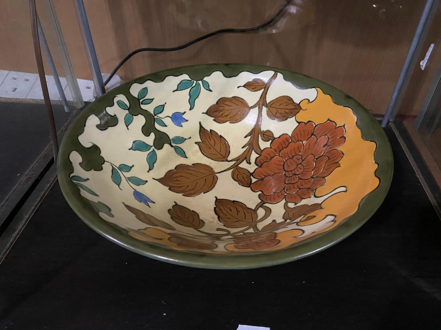 A vintage Gouda hand painted bowl.