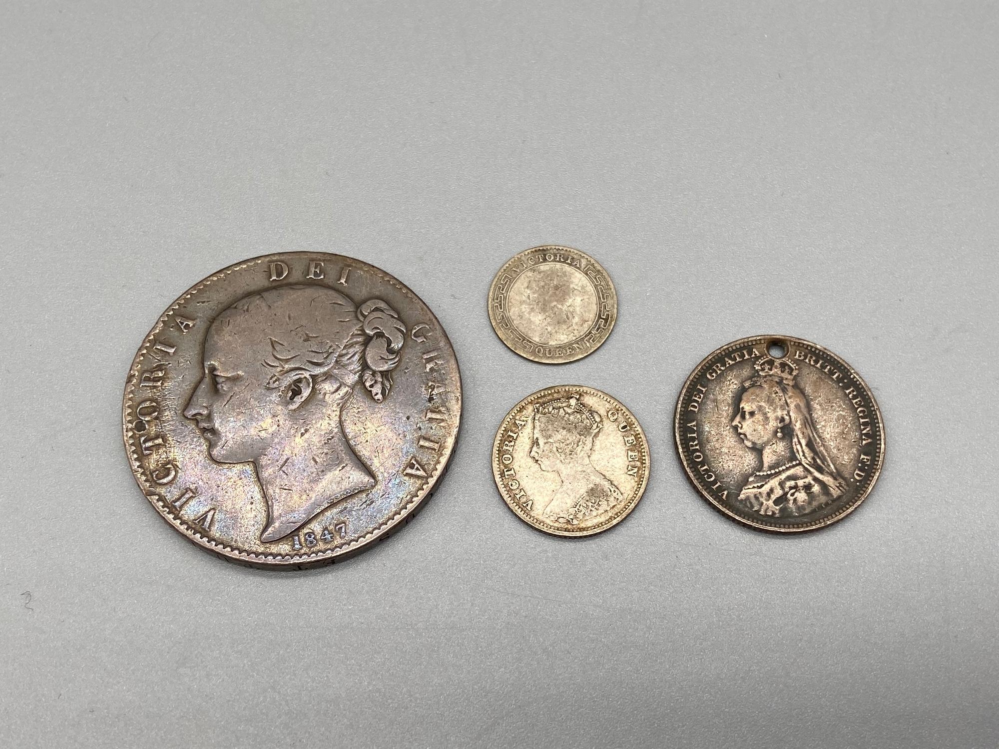 A Lot of four various Queen Victoria Silver coins which includes Young Victoria Head 1847 Crown