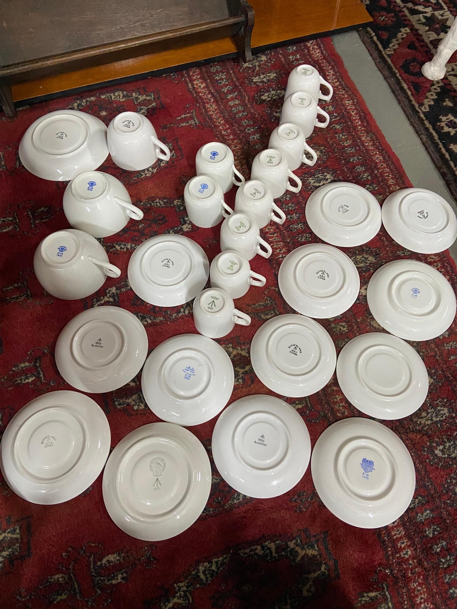 A Lot of various made military mess tea cups and saucers. Possibly Naval.