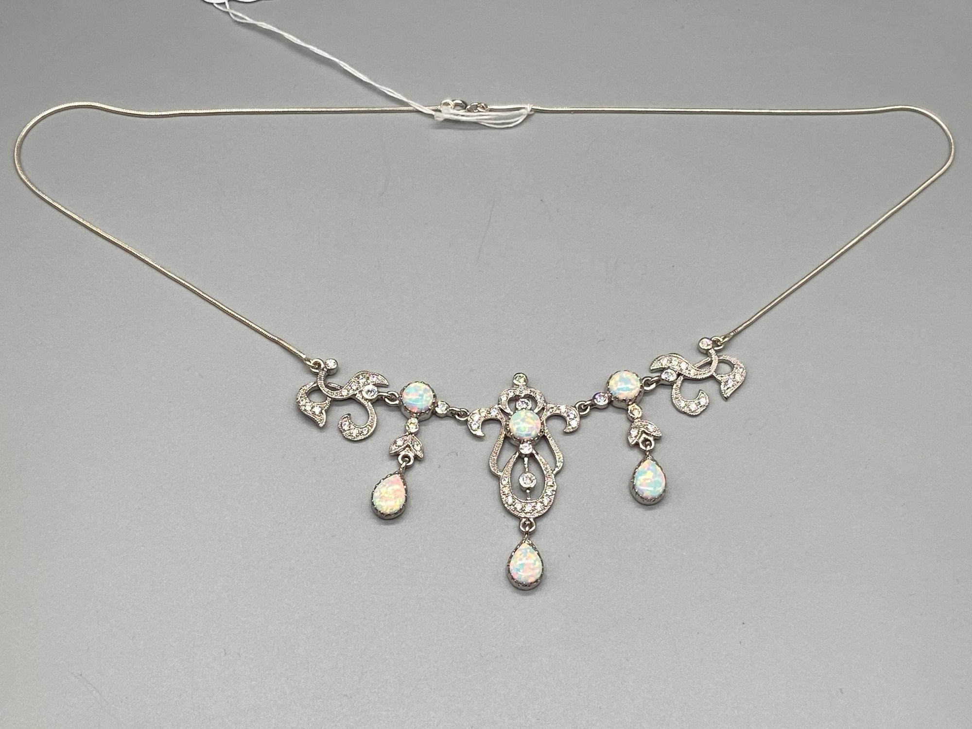 An Impressive silver and opal Belle Epoque style necklace.