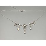 An Impressive silver and opal Belle Epoque style necklace.