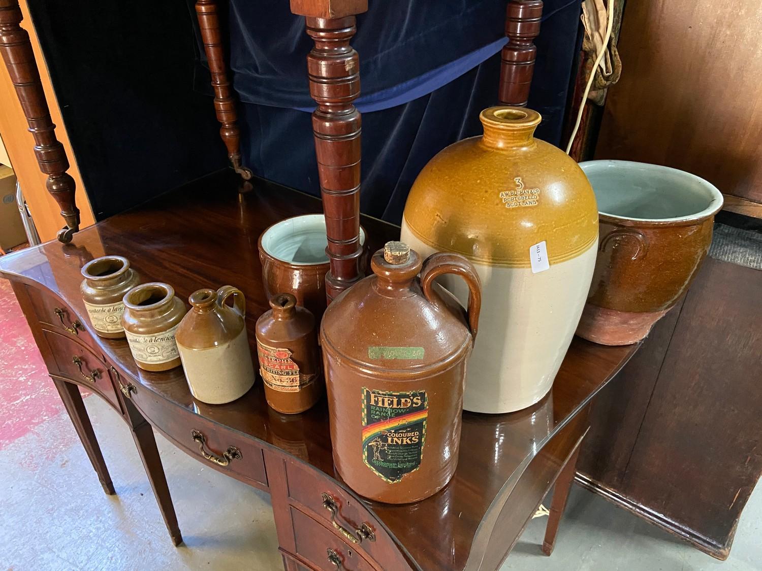 A Selection of various collectable stone ware flagons and pots. Includes a large A.W. Buchan & Co